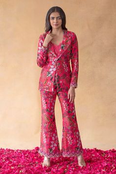 Floral Power Suit - Bold and Beautiful  Description:  Step into the spotlight with this stunning red floral power suit! Featuring a tailored fit with vibrant blooms and intricate details, this set blends boldness and femininity effortlessly. Perfect for those who love making a statement in a sophisticated way. Elevate your wardrobe with this standout look that’s both chic and comfortable for any occasion.  Hashtags:  #FloralSuit #BoldFashion #StatementOutfit #PowerSuit #FashionForward #ChicStyle #FloralPrint #VibrantFashion #TailoredLook #ootd Pant Blazer Women, Coat Pant For Women Party Wear, Traditional Blazer Outfits For Women, Blazer Outfits For Women Wedding, Traditional Blazers For Women, Coat Set For Women Indian, Indian Blazer Outfit Women, Blazer Outfits For Women Indian, Printed Blazers For Women