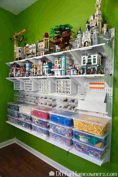 the shelves are filled with toys and other items in plastic bins on top of them