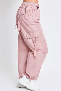 Add style, comfort, and versatility to your pant collection with our women’s elastic waist cargo pants. This relaxed-fit cargo pant is constructed with lightweight cotton fabric for maximum comfort and versatility. Our cargo pants for women have a relaxed leg, baggy fit from hip to hem, and are full-length with a drawstring hem for an option to wear open or tied for a cinched ankle. Detailed with two classic side patch front pockets, and two ring closure front and back pockets these cargo pants Woman Cargo Pants, Cute Cargo Pants, Hanfu Skirt, Side Pocket Pants, Pink Pant, Baggy Pants Women, Goodbye Party, Cargo Pants For Women, Cargo Pants Outfit Women