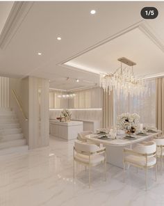 a dining room table with chairs and a chandelier hanging from the ceiling