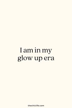 the words i am in my glow up era are black and white, against a cream background