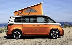 an orange minivan parked on top of a sandy beach