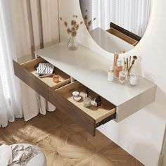 a vanity with two drawers and a mirror on the wall above it, in front of a window