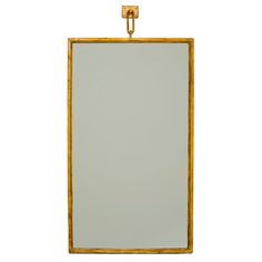 a gold framed mirror on a white background with clippings to the front and bottom