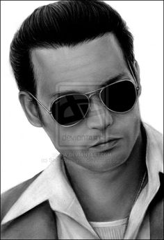 a black and white photo of a man wearing sunglasses