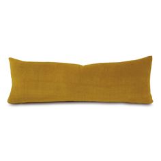 a yellow pillow on a white background with no one in the room to see it