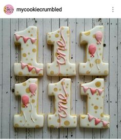 decorated cookies are arranged in the shape of numbers one, two, three and four