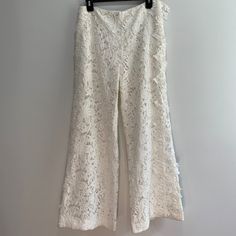 See Original Listing This Is Just For More Pictures Sb Sachin & Babi Noir Floral Lace Trouser Wide-Leg Pants Women’s Size 10 In Ivory White Color. Fully Lined, Hidden Side Zip Closure And Pockets! Classic And Chic Perfect For Summer, Vacation Getaways, Evenings, Special Events And Weddings Or Bridal Events. Pants Are Very Well Made, Fabric Used Is Good Quality Lace. Pants Are In Great Condition, Hem And Waist Have Been Altered. Still Has Material That Could Be Let Out If Needed. No Other Alterations Were Made And Lace Had No Rips Or Snags Etc. Please Message Me Directly If You Would Like My Measurements. Originally $500 With Tax Sachin & Babi Brand Can Be Found At Anthropologie, Sa Summer Bottoms With Lace Trim And Non-stretch Fit, Bohemian Cream Lace Bottoms, Cream Lace Bohemian Bottoms, Cream Lace Stretch Bottoms, Non-stretch Lace Pants For Spring, Ivory White Color, Sachin Babi, Bridal Events, Lace Pants