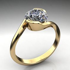 a yellow gold engagement ring with a large diamond