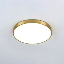 a close up of a ceiling light on a white wall