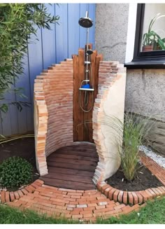 an outdoor shower built into the side of a building