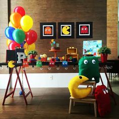 an instagram page with balloons and pictures on the wall, including a dinosaur chair