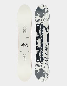 the snowboard is white and black with an abstract design on it's side