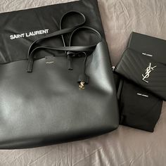 New Never Used Shopper Ysl Tote Bag Bought At Neiman Marcus. Black With Gold Accent. Have Wallet In Another Listing Ysl Shopping Tote, Ysl Black Bag, Ysl Tote Bag, Ysl Tote, Saint Laurent Purse, Marcus Black, Vintage Tote Bag, Saint Laurent Handbags, Saint Laurent Bags