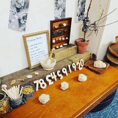 a table topped with lots of different types of cookies and pastries on top of it