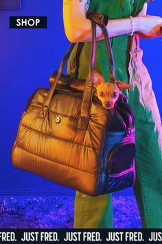 This destination tote limited edition dog carrier has a built-in dog waste bag dispenser, zipped top and peekaboo window.  This bag is vegan and PETA approved. Shop now at Just Fred. Luxury Pet, Dog Bag