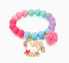 Whimsical charms and colorful beads make a sweet statement about some of her favorite things! The Unicorn Bracelet is perfect for Unicorn fans and features colorful beads, a magical unicorn charm and a perfectly pink pompom! Pair with matching Cutie Studs/Clip-Ons and Charming Whimsy Necklace to complete the look or Mix and Match designs to show off all her favs! The Charming Whimsy Bracelet Collection features Rainbows, Unicorns, Ballet Shoes, Llamas and more! Hypoallergenic, Nickel and Lead Fr Baby Baptism Gifts, Unicorn Bracelet, Unicorn Charm, Copper Pearl, Baby Bottoms, Toy Brand, Top Baby Products, Girl Jewelry, Magical Unicorn