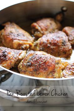 some meat is cooking in a pan on the stove