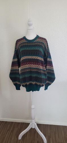 Men's vintage Glenallan sweater, made in Scotland from 65% acrylic, 34% wool, and 1% nylon. Stunning detail knit in greens, maroon, tan and grey. This sweater is the perfect mix of unique and cozy, you'll be sure to receive lots of compliments every time you wear it (and maybe some hugs). Size L. Measurements are as follows: Shoulders: 24 inches across Chest: 42 inches around Waist: 42 inches around Side inseam: 17 inches Sleeve inseam: 20 inches FREE SHIPPING within the US. Message me for shipping rates outside of the United States. Crochet Grandpa Sweater, 80s Sweater, Grandpa Sweater, Sweater Vintage, Vintage Sweater, Sweater Making, Vintage Sweaters, Wool Sweater, Wool Sweaters