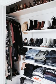 a closet filled with lots of clothes and shoes