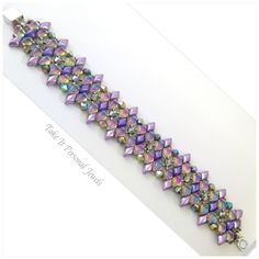 a bracelet with purple and silver beads on it