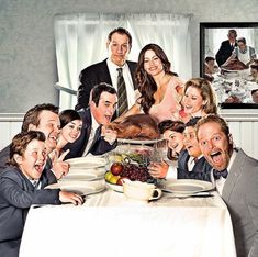 a group of people sitting around a dinner table