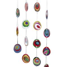 a wind chime with multicolored glass discs hanging from it