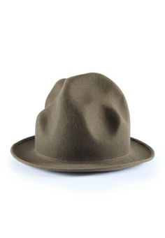 The Mountain or Buffalo Hat, as it is also referred to as, sits 8 inches tall with a 2.5 inch brim. Available in camel, black, navy, green, bordeaux, red and fuchsia pink felt and a woven straw version for the summer. Types Of Hats For Women, Mountain Hat, Fall Hats, Fancy Hats, Pharrell Williams, Casual Hat, Brim Hat, Mens Street Style, Vivienne Westwood