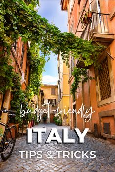 an alley way with ivy growing on the buildings and bikes parked in front of it