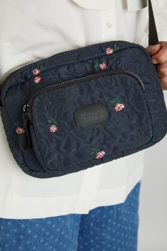 Our best-selling Camera Bag is back in a new ditsy rose print, with an added quilted rose design. This bag features chunky zips, an adjustable strap & branded gummy. - 100% Recycled polyester - Made in China - Use a mild detergent to dab dirty marks. Body Camera, Reversible Tote Bag, Canvas Makeup Bag, Scarf Yarn, Quilted Backpack, Reversible Tote, What In My Bag