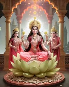 there is a statue of the hindu goddess sitting on top of a lotus in front of two other statues