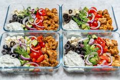 four glass containers filled with different types of food