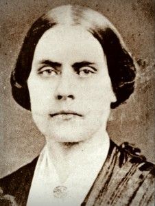 an old black and white photo of a woman