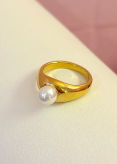 Stainless steel, 18k gold plated ring Gold chunky ring with single pearl Gold Open Pearl Ring, Gold Pearl Open Ring, Gold Pearl Ring With Metal Band, Gold Open Pearl Ring With Metal Band, Classic Gold Plated Round Pearl Ring, Round Metal Pearl Ring For Anniversary, Open Pearl Ring For Anniversary, Pearl Ring For Anniversary, Anniversary Pearl Ring With Round Metal Setting