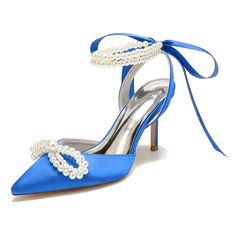 a blue high heeled shoe with pearls on the ankle