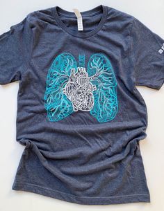 Heart & Lungs Unisex T.Shirt – arteryink Anatomy Graphic, Anatomy Shirts, Heart Lungs, Ink Logo, Heart And Lungs, Hospital Staff, Anatomical Heart, Nurse Uniform, Cardiology