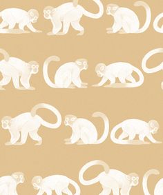 several white monkey silhouettes on a beige background