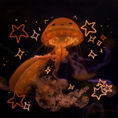 a jellyfish is floating in the dark with stars on it's back end