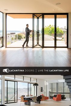 a man walking into a living room next to an open door with the words la canta doors live the lagunana life