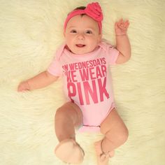 "This \"On Wednesdays We Wear Pink\" Bodysuit design is made from beautiful Pink Vinyl art. The design is professionally applied to your choice of size of a light pink Bodysuit. A perfect choice for your baby girl for her Wednesday attire :) This matches great to many of our pink tutus! **Please wash inside out on gentle cycle in cold water and lay flat to dry. You can order this in size Newborn to 18 months. The sizing chart for the Bodysuits are: Size Pounds Newborn Up to 7 0-3M 7 - 12 3-6M 12 Pink Onesie With Letter Print For First Birthday, Pink Fitted Onesie For Birthday, Cute Pink Short Sleeve Bodysuit For Playwear, Playful Pink Onesie With Letter Print, Pink Cotton Onesie For Playwear, Pink Fitted Onesie For Playtime, Fitted Short Sleeve Pink Bodysuit For Playwear, Pink Letter Print Onesie For Summer, Cute Pink Onesie With Letter Print