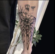 a person with a tattoo on their leg holding a knife and wearing a top hat