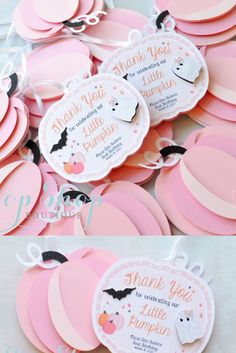 pink and white paper cutouts with bats on them for halloween party favors or baby shower decorations