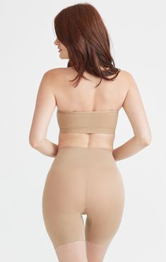 If you’re a fan of our Ultralight Short, you’ll love this slip short with a longer inseam to protect your inner thigh from the dreaded chafe. It provides the perfect amount of support with our Yummie Hug at the tummy. Light shaping - soft contouring that subtly enhances your curves while ensuring all-day comfort. ideal for a gentle but noticeable enhancement. 2" wide 2-ply waistband provides shaping at the tummy Debossed icon logo at front Comfortable side seam free construction Style YT5-369 Bo Slip Shorts, Inner Thigh, Bleach, Almond, Fan, Spandex