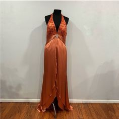 On Sale Is A Cir A Division Of Landa Flame Orange Plunge Neck Halter Gown 16 Y2k. It Is New With Tags. There Are Some Runs On The Back Of The Dress (Pictured). The Measurements Are Approximations Length Of Back (Pit To Hem)- 56 Inches Width (Pit To Pit)- 19 Inches Waistline- 16 Inches Orange Princess Dress, Orange Vintage Dress, Orange Long Dress, Orange Long Dresses, Brown Cotton Dress, Charcoal Grey Dress, Pixie Hollow, Halter Gown, Bra Dress