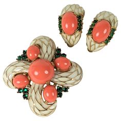 Trifari L'Orient Series Brooch and earring set from the 1960's. Done in a David Webb style with faux cab coral and emeralds with enamel. Crest brooch and clip earrings. 1960's USA, Brooch 2", Earrings 1" x .5". Contemporary Costumes, Rose Brooch, Trifari Jewelry, David Webb, Fashion 1950s, 2 Earrings, Fun Jewelry, Crown Jewels, Modern Earrings