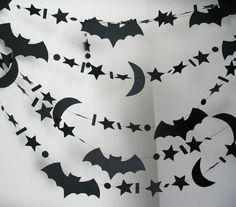 bats and crescents are hanging from the ceiling