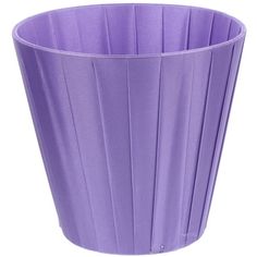 a purple vase with pleated design on the bottom and sides, sitting in front of a white background