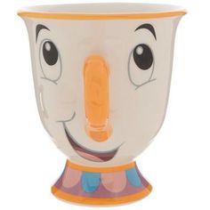 a white cup with an orange nose and eyes