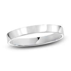 a white gold wedding ring on a white background