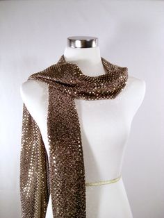 "IMPORTANT - Read all \"ITEM DETAILS\" before ordering. Gold Sequin Party Scarf - Gold on Black Long Scarf - Gold Sequin Scarf - Shiny Gold Sequin Scarf - Dressy Long Scarf - Gold Sequin Wrap ** Choice of squared or tapered ends. ** Great accent for that holiday party dress. Makes a great gift, too! Light weight sequined knit fabric. Shiny gold sequins on a lightweight black sparkly knit fabric. Professionally finished, edges are serged with a decorative three thread hem. DIMENSIONS: Approximate Gold Sequin Fabric, Wedding Scarf, Sequin Scarf, Gold Scarf, Holiday Party Dress, Sequin Party, Wedding Sash, Holiday Party Dresses, Gold Party